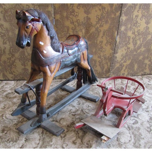 1179 - A child’s painted carved wood rocking horse, 82cm high, 94cm long, together with a smaller scratch-b... 