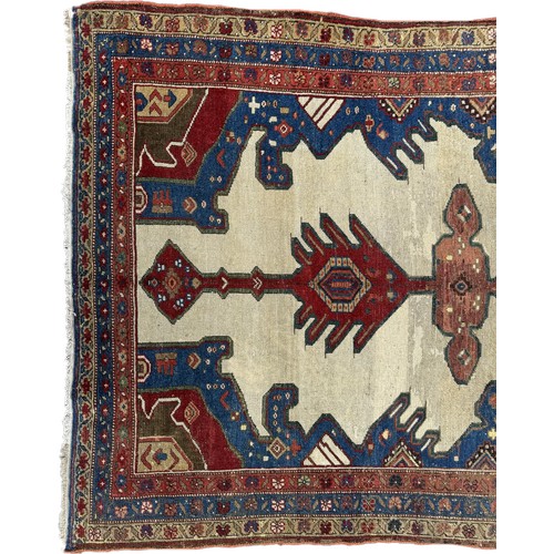 1755 - An old Persian Kelleh runner with an elongated hooked and stepped medallion 325cm x 125cm approximat... 