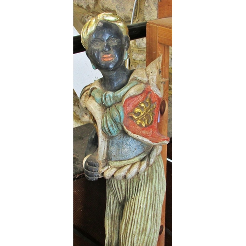 435 - A 19th century Venetian carved and painted wood ‘Blackamoor’ figural torchere stand (A/F) 122cm high... 