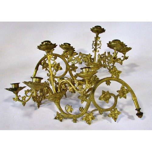 537 - A heavy antique ecclesiastical brass pricket candlestick in the old English style, with tapering tur... 