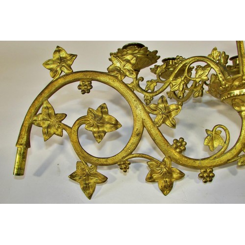 537 - A heavy antique ecclesiastical brass pricket candlestick in the old English style, with tapering tur... 