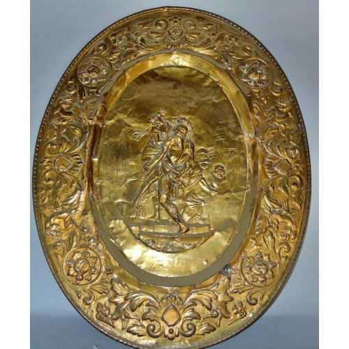 463 - A decorative late 19th century brass charger decorated with a stylised owl before crescent moon and ... 