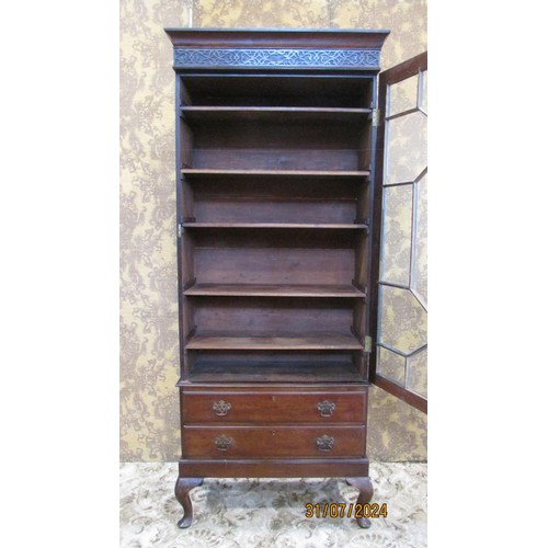 1188 - An Edwardian glazed mahogany bookcase in the Georgian style the lower section enclosed by two drawer... 