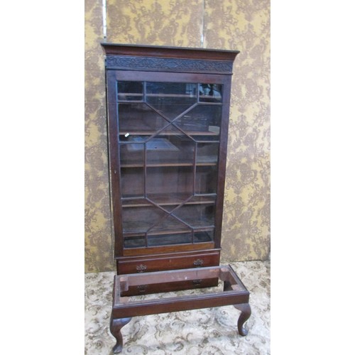 1188 - An Edwardian glazed mahogany bookcase in the Georgian style the lower section enclosed by two drawer... 