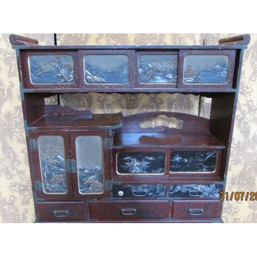 1190 - A 19th century Japanese lacquered writing desk, the raised back enclosing drawers and cupboards, lan... 