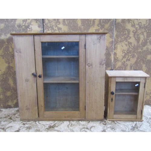 1194 - An old pine glazed cabinet with a single door, 80cm w x 77cm h x 32cm d, together with a smaller old... 