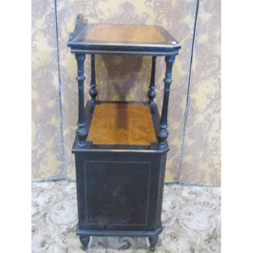 1241 - A Victorian watnot with enclosed base with amboyna wood panels and ebonised borders