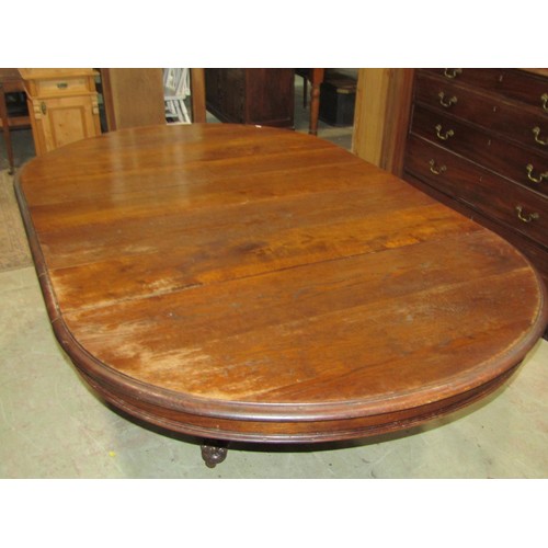 1243 - A Large Victorian oak D end dining table, raised on a central pillar with scroll and lion detail, wi... 