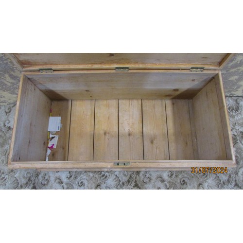 1199 - A stripped pine blanket chest with inset carrying handles raised on block feet 110cm w x 49cm h x 54... 