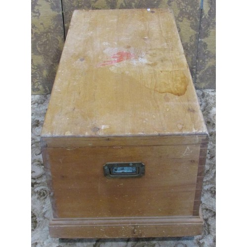 1199 - A stripped pine blanket chest with inset carrying handles raised on block feet 110cm w x 49cm h x 54... 