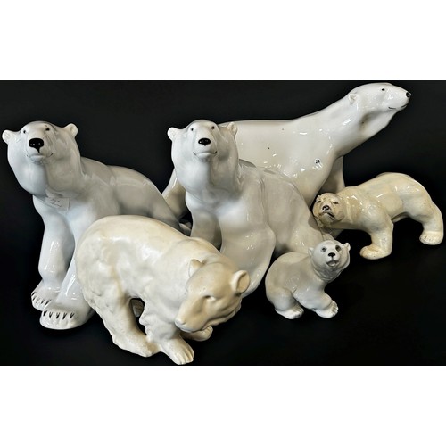 156 - A collection of six ceramic polar bears in various poses