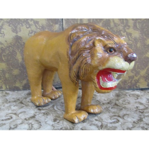 1248 - A large Indian papier-mâché figure of a male lion in standing pose, 60cm high