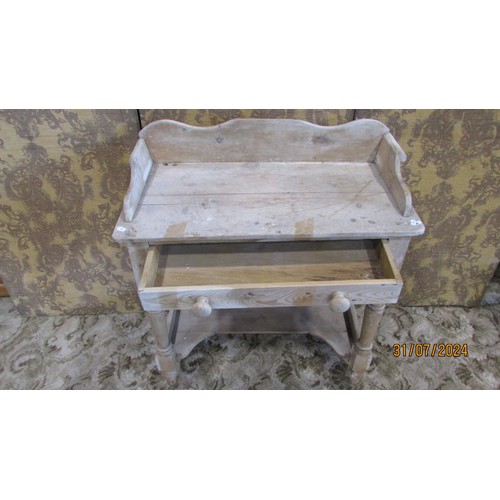 1203 - An old pine washstand with a shaped splash back and under tier, 82cm w x 89cm h x 43cm d,  together ... 