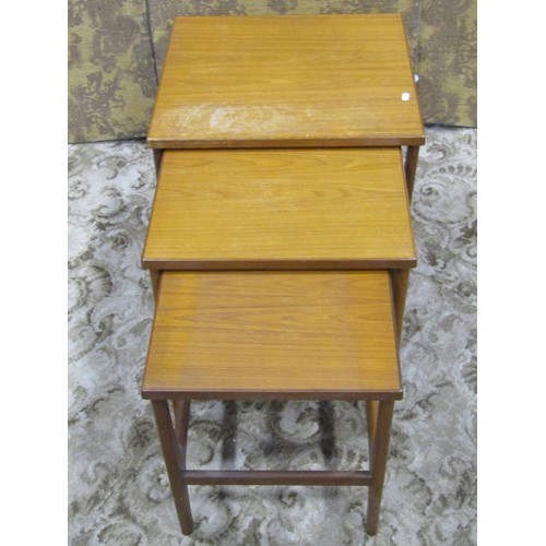 1257 - A nest of three G plan style teak graduated tables, 52cm wide x 48cm deep x 52cm high and smaller (3... 