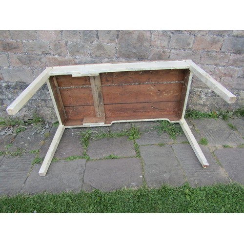 1217 - An old Dairy table, with a three plank pine top on a painted base with square tapered supports, 135c... 