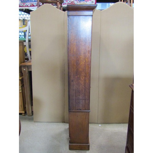 1259 - An Edwardian oak bookcase fitted with an arrangement of open shelves and two central doors, 174cm hi... 