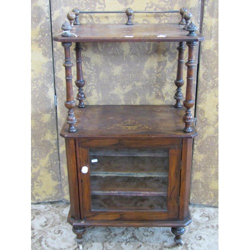 1211 - A Victorian walnut music cabinet with decorative satinwood inlay, a raised top over a single glazed ... 