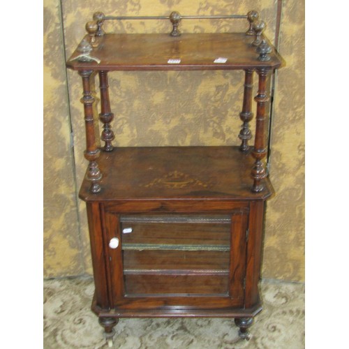 1211 - A Victorian walnut music cabinet with decorative satinwood inlay, a raised top over a single glazed ... 