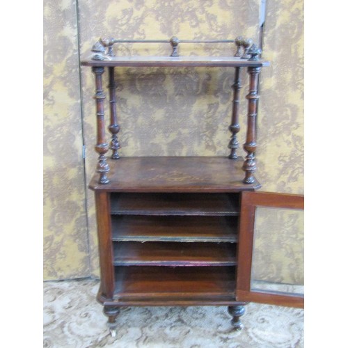 1211 - A Victorian walnut music cabinet with decorative satinwood inlay, a raised top over a single glazed ... 