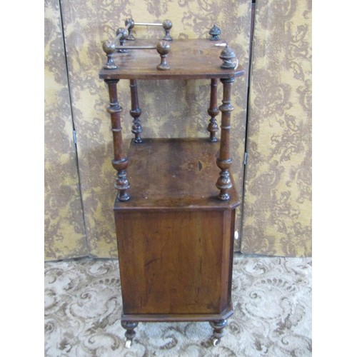 1211 - A Victorian walnut music cabinet with decorative satinwood inlay, a raised top over a single glazed ... 