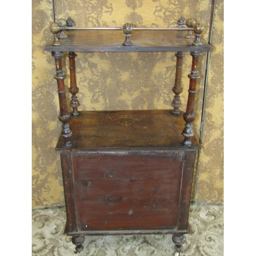 1211 - A Victorian walnut music cabinet with decorative satinwood inlay, a raised top over a single glazed ... 