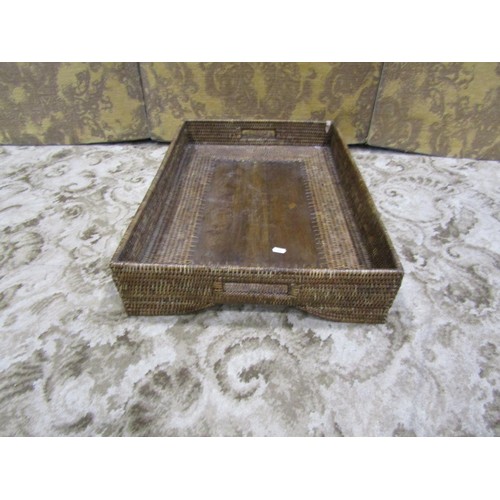 1205 - Three similar Butler’s woven cane trays / occasional tables, all with folding stands, with labels Ta... 