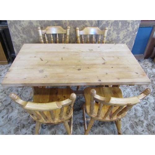 1197 - A small pale pine refectory type dining table, 73cm high, 137 x 76cm, together with four associated ... 