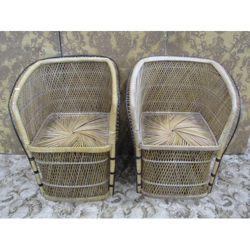 1216 - A pair of conservatory tub wicker chairs.