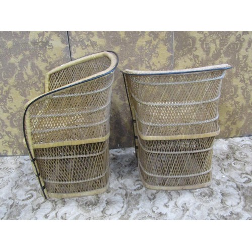 1216 - A pair of conservatory tub wicker chairs.