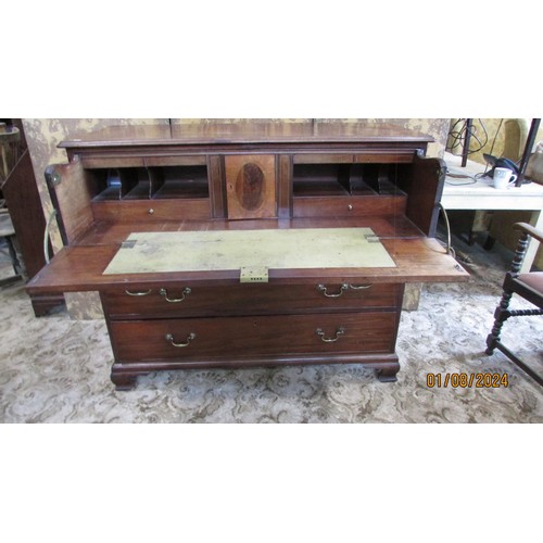 1262 - A Georgian mahogany secretaire chest of four long drawers with fitted interior on ogee supports, 130... 