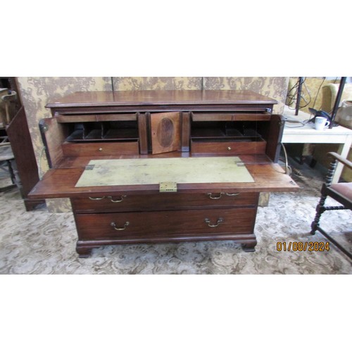 1262 - A Georgian mahogany secretaire chest of four long drawers with fitted interior on ogee supports, 130... 