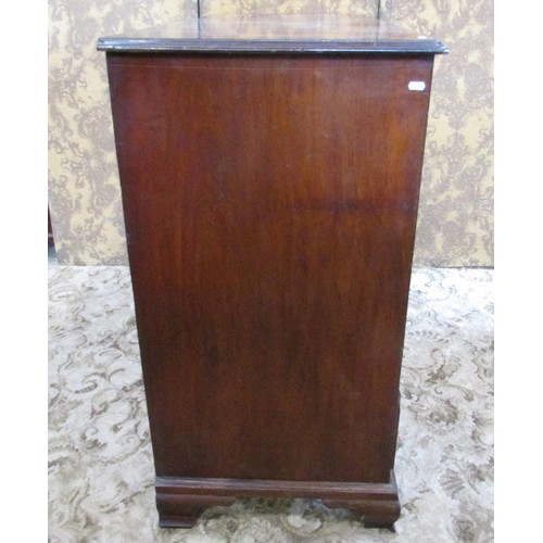 1262 - A Georgian mahogany secretaire chest of four long drawers with fitted interior on ogee supports, 130... 