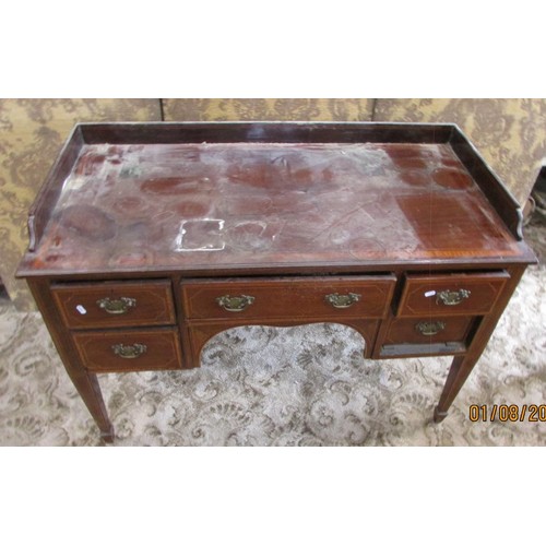 1267 - An inlaid Edwardian mahogany side or writing table of five frieze drawers on square tapered legs wit... 