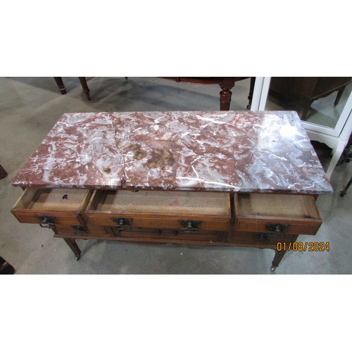 1269 - An Art Nouveau washstand in oak with enclosed front beneath a marble top (top af)