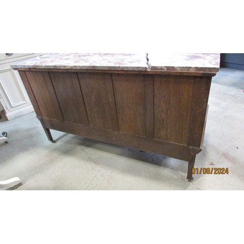 1269 - An Art Nouveau washstand in oak with enclosed front beneath a marble top (top af)