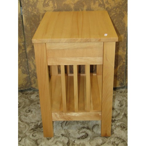 1273 - A contemporary beechwood side table with under gallery, 53cm wide