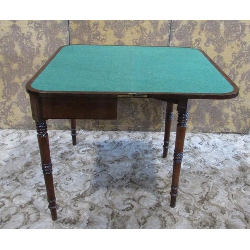 1279 - A 19th century mahogany D end foldover top card table on turned supports