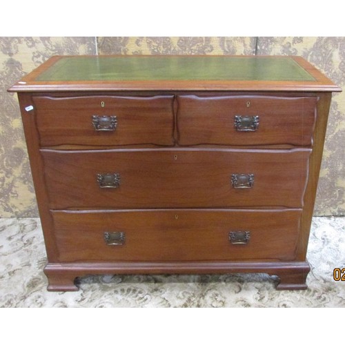 1280 - An art nouveau chest of two long and two short drawers with inset leather top, 85cm high x 105cm wid... 