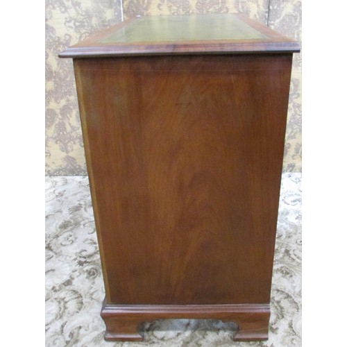 1280 - An art nouveau chest of two long and two short drawers with inset leather top, 85cm high x 105cm wid... 