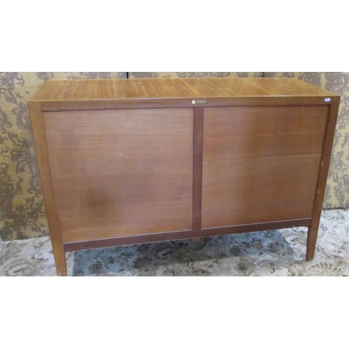 1290 - A mid 20th century retro Gordon Russell ‘Helix walnut sideboard, with incised hinged panelled doors ... 