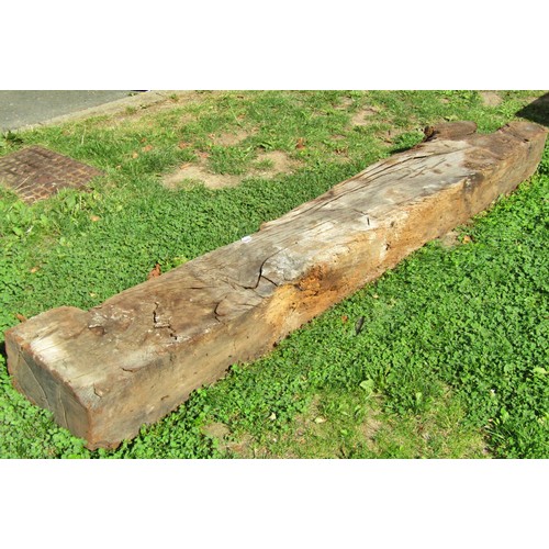 1076 - Architectural salvage, a reclaimed early oak lintel 18 cm high x 202 cm (full length) x 30 cm wide a... 