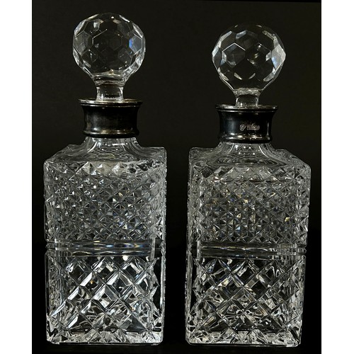 193 - A pair of square cut-glass decanters with silver collars, dated 1985, Birmingham CJ Vander Ltd