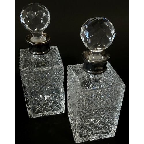 193 - A pair of square cut-glass decanters with silver collars, dated 1985, Birmingham CJ Vander Ltd