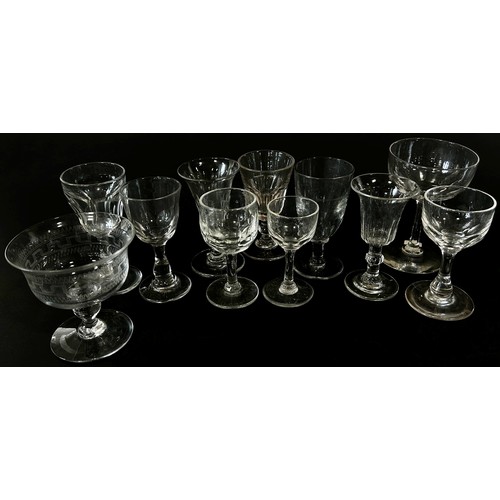 206 - A good collection of 19th and 20th century 28 wine glasses and toasting glasses, some of bell shape,... 