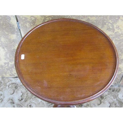 1298 - A Victorian mahogany tray top pedestal tripod wine / occasional table, 74cm high, 46cm diameter.