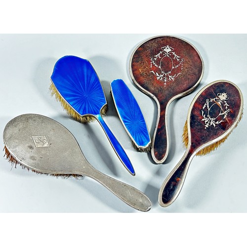 271 - A mixed selection of hairbrushes and hand mirrors with silver banding, together with a glass jar wit... 