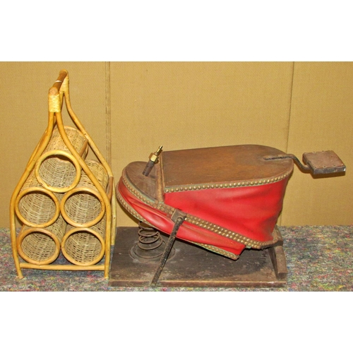 1162 - A pair of foot bellows and a contemporary bottle rack (2)