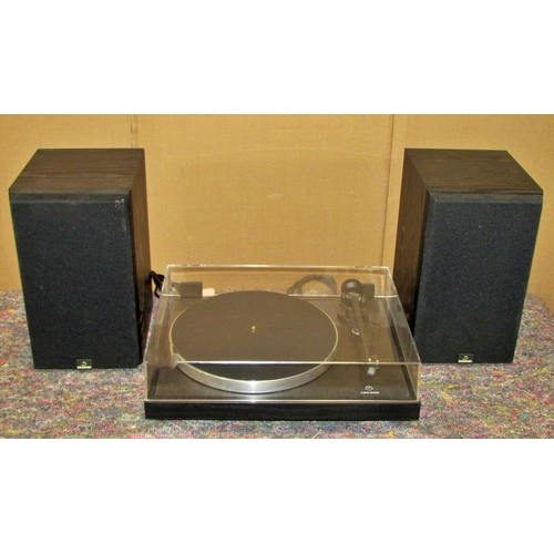 1163 - A vintage stereo equipment to include a Linn Basik turntable, Rotel stereo tuner RT-930AX, stereo in... 