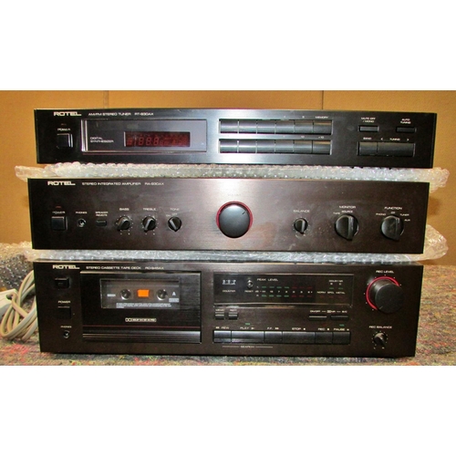 1163 - A vintage stereo equipment to include a Linn Basik turntable, Rotel stereo tuner RT-930AX, stereo in... 