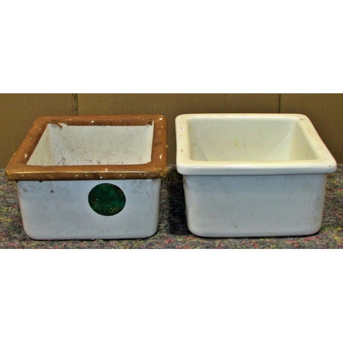 1166 - Two small Royal Doulton laboratory sinks each marked Westwood to underside, each 18cm high, 33 x 33c... 